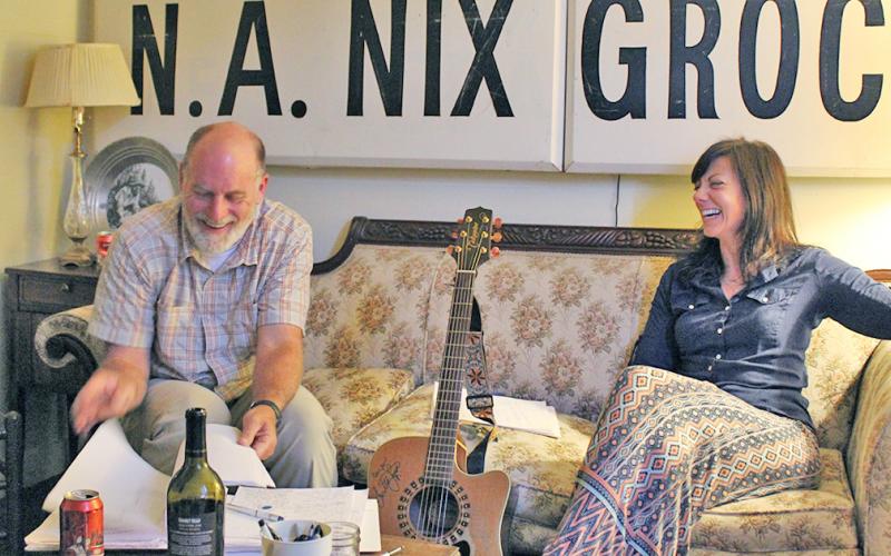 Songwriter Betsy Franck works with Billy Luesing on the lyrics of Luesing's original song during the first Song Saloon meeting. The group meets on the 2nd and 4th Tuesday of each month at The Crimson Moon from 7-9 p.m.